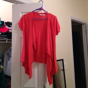 Coral short sleeved wrap sweater.