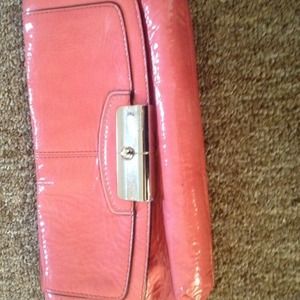 Coach wristlet with great hardware.