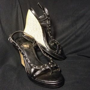 Black studded, wedge sandals. Size 8 or 8.5 adjust