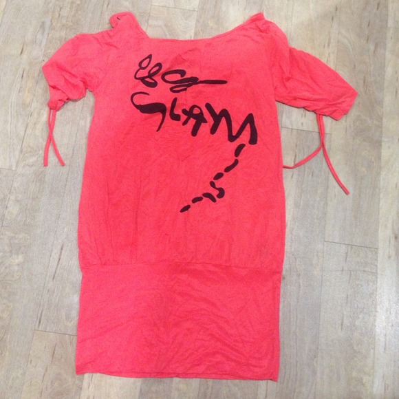 Orange tunic shirt🎀Back has a cut out and a bow