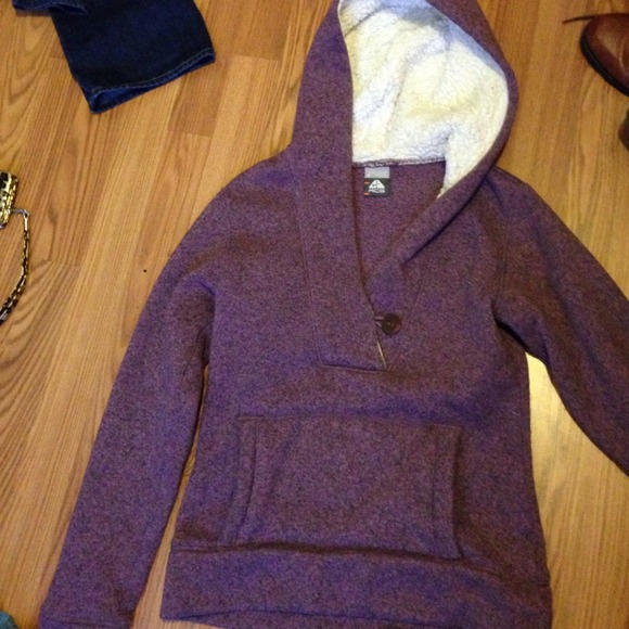 Purple hoodie. I believe it's nike?