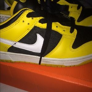 Black and yellow low top nike dunks