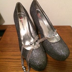 Like New Just Fab Silver Sparkly Platform Pumps.