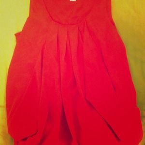 Loosely ruffled red shirt