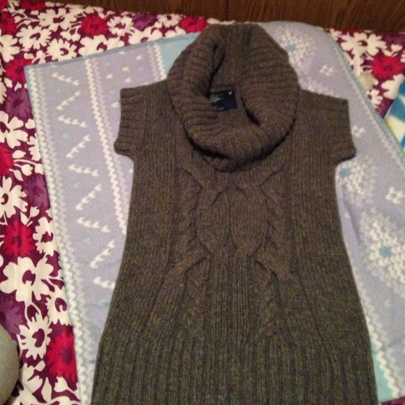 Grey short sleeve wool top.