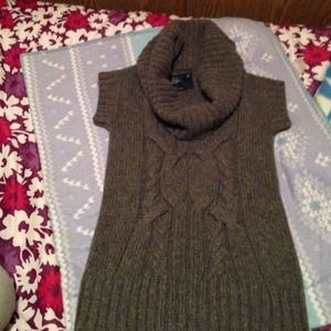 Grey short sleeve wool top.