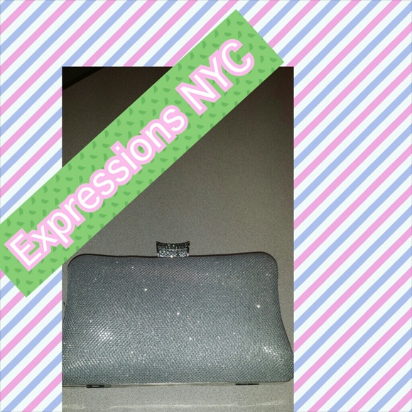 Like new silver clutch