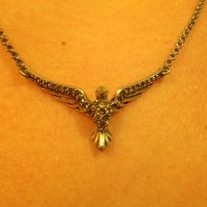 Fossil rhinestone studded silver bird necklace