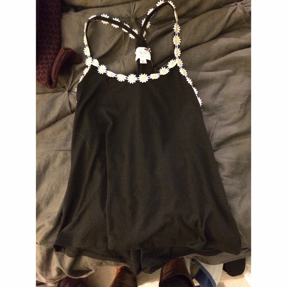 Daisy and black tank