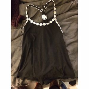 Daisy and black tank