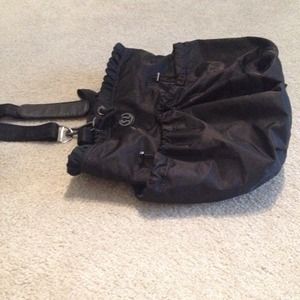 Black Lululemon gym bag with zip-in insert.