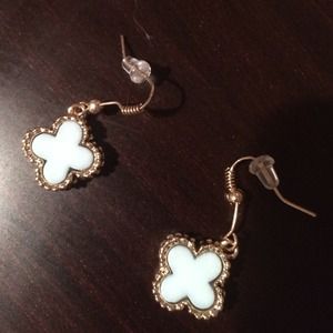 Very cute, never been worn cross earrings.