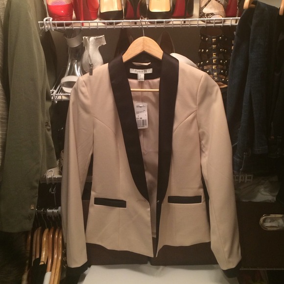 Tan and black tuxedo style blazer