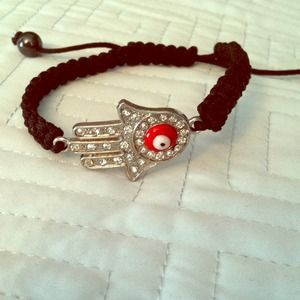 Evil eye pull string brackete. 💜