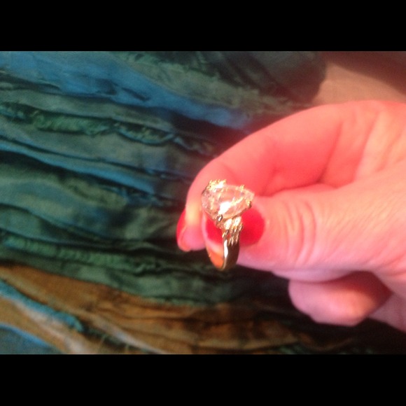 Extravagant pear shaped simulated diamond ring