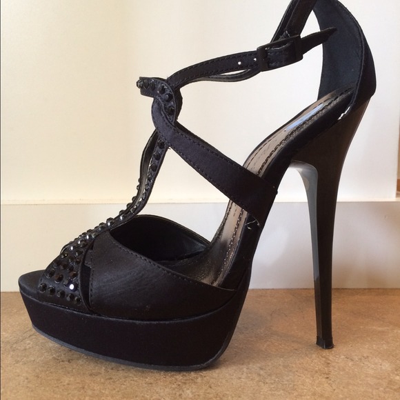 Black 5-6" platform high heels.
