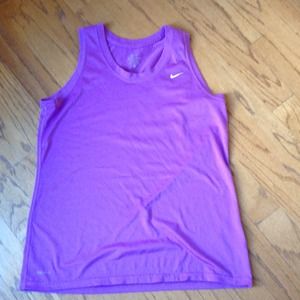 Bundled 4 workout shirts nike and underarmor.