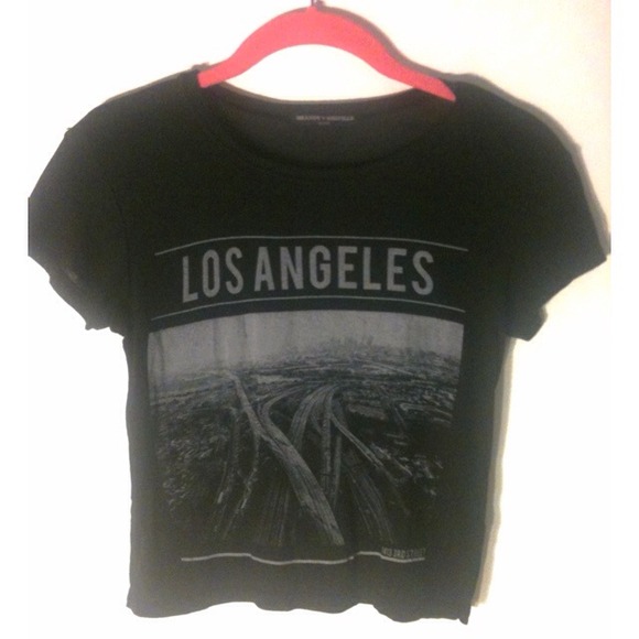 Brandy Melville Tops - ✖sold✖ Brandy melville black Los Angeles Carolina