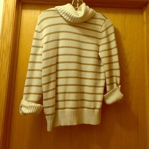 White turtleneck with gold stripes
