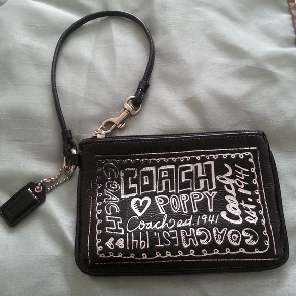 *SOLD***Authentic Poppy Coach wristlet..