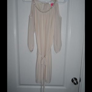 Sheer nude color off the shoulder dress.