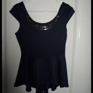 Dark blue peplum shirt.
