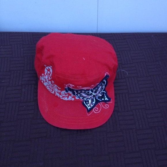 Red Hat with a butterfly on the side