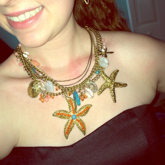 Beautiful gold, nautical charm necklace.