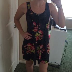 black dress with polka dots and flowers