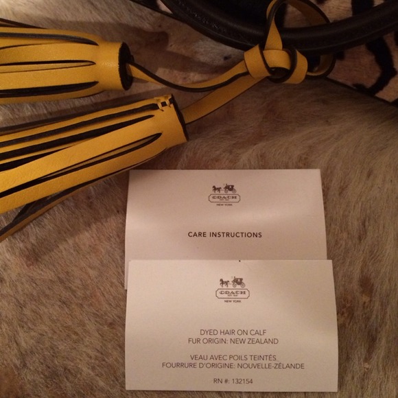 ⛔️RECONSIDERING⛔️ Coach Legacy Ocelet Haircalf - Picture 4 of 4