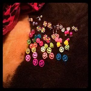 A grouping of 27 pairs of post back earrings