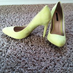Neon yellow pumps