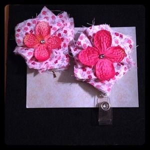 Name badge holder and matching hair accessory.