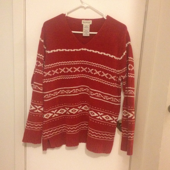 Women's red sweater. Christmassy pattern