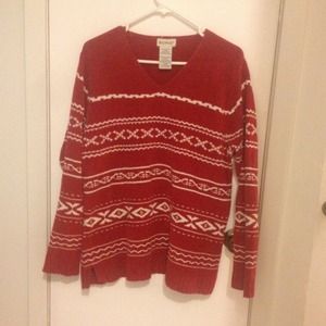 Women's red sweater. Christmassy pattern