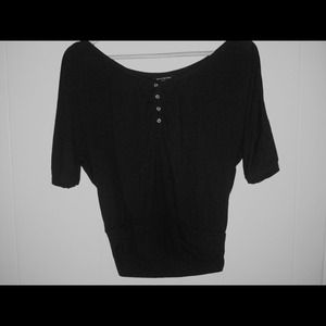 Black waist length top with half-sleeves. NWOT.