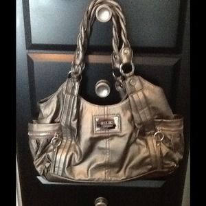 Relic brand handbag in silver/metallic color.