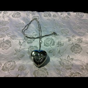 Beautiful Avon Silvertone Heart Pendant