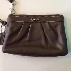 Brown leather Coach wristlet