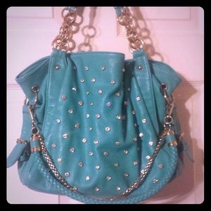 Teal handbag.