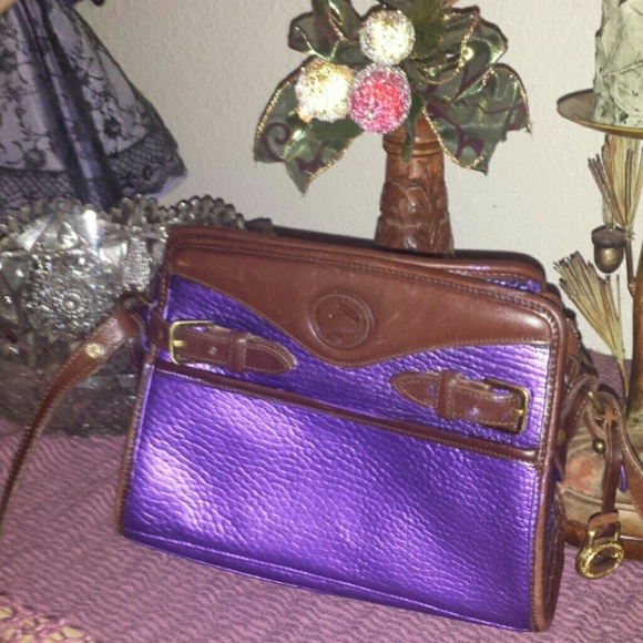 Dooney Bourke all leather shoulder / crossbody bag