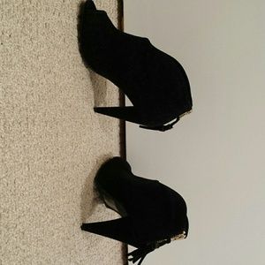 Black suede booties.