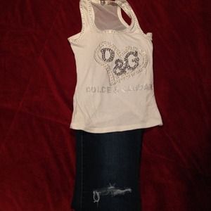 Jeans and white d&g shirt.