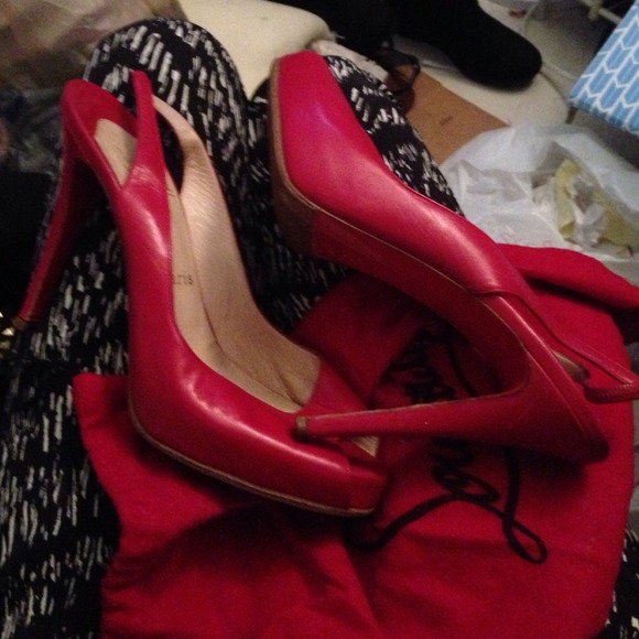 Authentic Louboutin red shoes