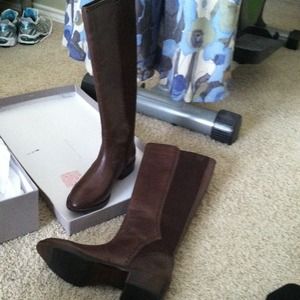 Tall leather and stretch brown boots; never worn