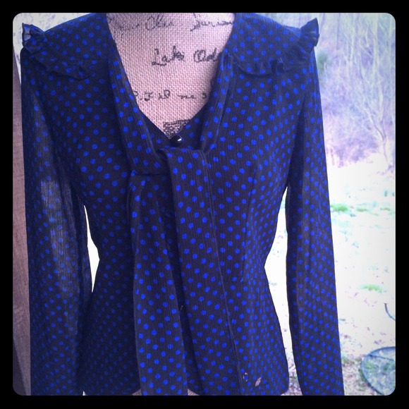 Beautiful black blouse with bright blue dots