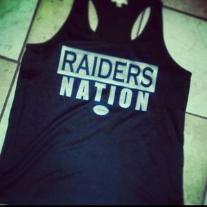Raiders lose tank top