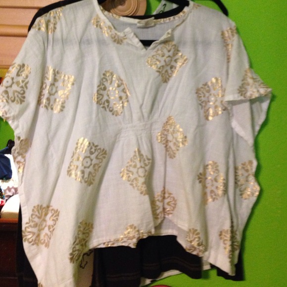 White and gold shirt