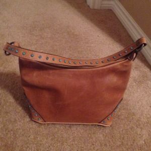Cute brown handbag with turquoise stone detailing