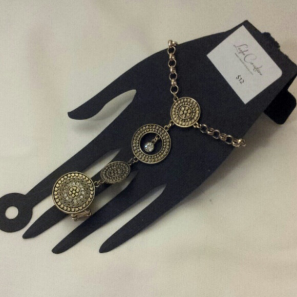 brass color ring bracelet